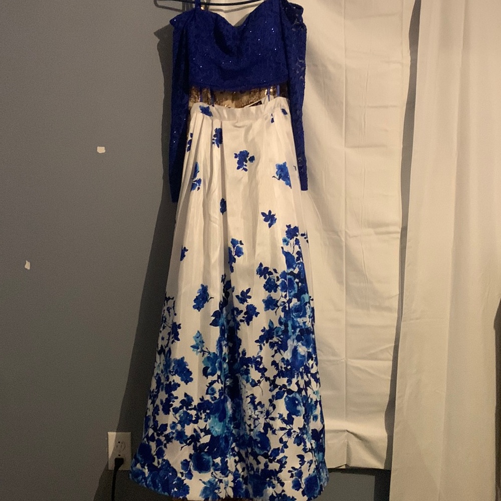 Prom dress by sequin hearts and worn 1 time. This dress is a 2 piece.